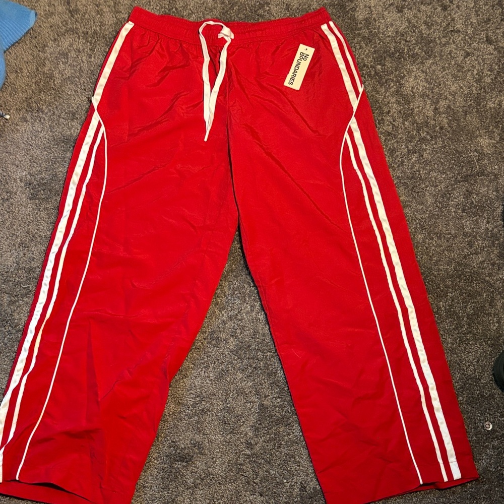 Red Track Pants with White Stripes